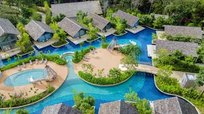 an aerial view of a resort with a pool at Island Escape Burasari in Phuket Town