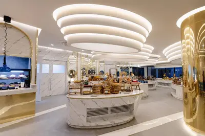 a store with large chandeliers and a large lobby at Wyndham La Vita Rawai Phuket in Rawai Beach