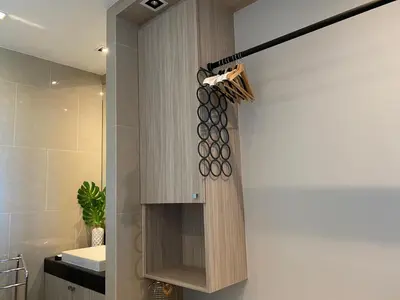 a bathroom with a sink and a shower at Phuket View Coffee and Resort in Chalong