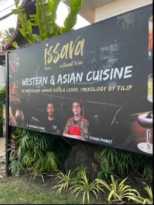 a sign for a museum and asian cuisine at Kata gardens luxury 2bedroom 4B Near Kata Noi Beach in Kata Beach
