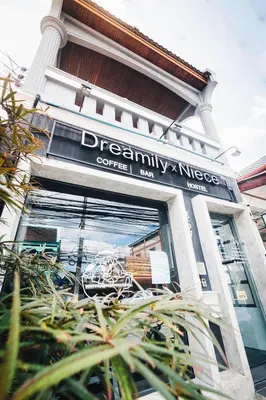 a sign on the front of a coffee shop at Niece Hostel Phuket - Bangtao Beach in Ban Thalat Choeng Thale