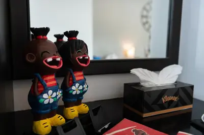 two stuffed animals are standing on a table at May House Karon Beach in Karon Beach