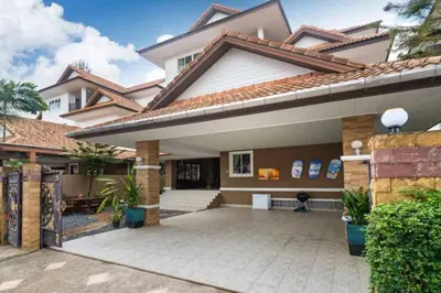 a house with a courtyard in front of it at Phuket Pool Villa Sea view at town in Phuket Town