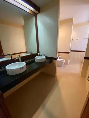 a bathroom with two sinks and two toilets at Phuket Pool Villa Sea view at town in Phuket Town
