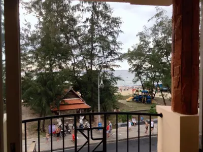 a view from a window of a playground at PHADEE APARTMENT in Karon Beach