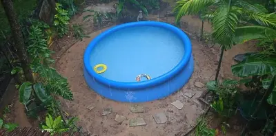 a blue tub sitting in the middle of a yard at Antonio's Ko Yao Noi in Ko Yao Noi