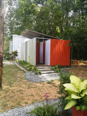 a house with a red and white facade at ฺBankunyaiy Resort in Ko Yao Yai