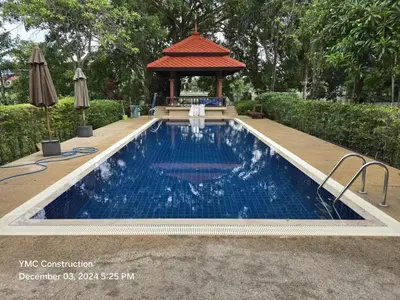 a swimming pool in front of a gazebo at laguna waters \u60a6\u6995\u5e84 \u62c9\u53e4\u7eb3 in Bang Tao Beach