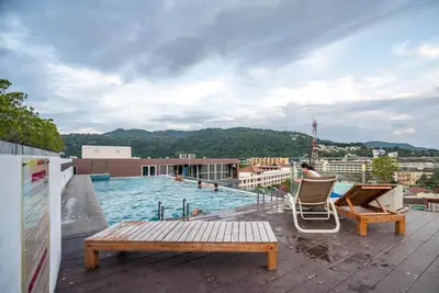 a swimming pool on the roof of a building at Ozone Kata -Great location, rooftop pool, convenient studio in Karon Beach