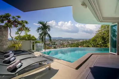 a villa with a swimming pool with a view at Villa Beyond-Namaste 16 Bedroom Fully Staffed Seaview Villa in Ban Thalat Choeng Thale