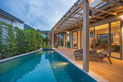 a swimming pool in the backyard of a house at Modern Pool Villa Dalaa 7 in Kamala Beach