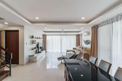 a living room with a pool table and chairs at 5bdr Pool Villa In Laguna Park #46 By Capital Pro in Bang Tao Beach