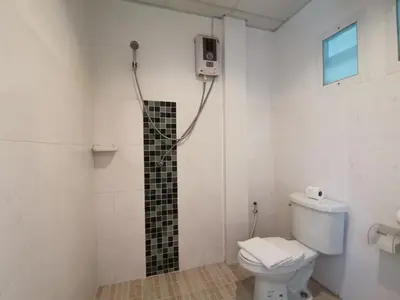 a shower in a bathroom with a toilet at Serene Villa Phuket in Chalong