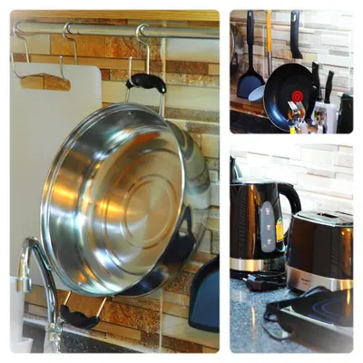 a kitchen with a copper pot hanging from a wall at Pak Dee At Naithon in Nai Thon Beach