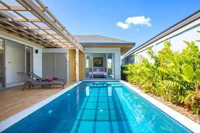 a swimming pool in the backyard of a villa at Resort Boutique 2BR Villa Dalaa 4, Private Pool, Full Service, 5 min Drive Kamala Beach in Kamala Beach