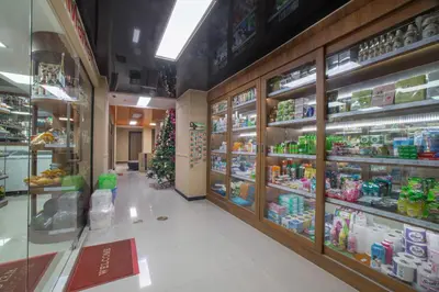 a store aisle with a christmas tree in a store at NARA Condo 1BR Pool View NBC Nai Harn in Nai Harn Beach