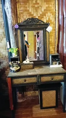 a table with a mirror on top of it at P P Garden Home Bungalow in Phi Phi Don