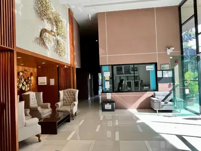 a lobby with chairs and a waiting room at Aristo Resort Surin Beach K02 in Surin Beach