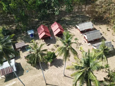 an aerial view of a resort with palm trees at Mr Bao Homestay & Bungalows in Ko Yao Noi