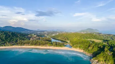 an aerial view of a beach and the ocean at Sara's Nest - Top Floor Seaview apartments in Nai Harn Beach