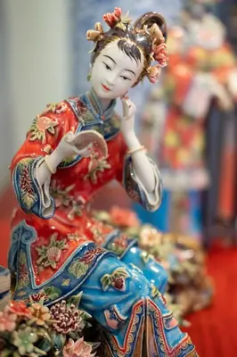 a figurine of a woman in a kimono at Sino Siam Hotel in Klong Muang Beach