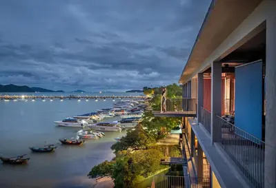 a view of a harbor with boats in the water at SHIN Arch39 Phuket Beach Front - SHA Plus in Chalong