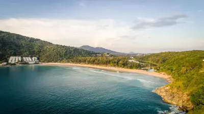 an aerial view of a beach and the ocean at NaiHarn Pearl Condo - Pets Friendly! in Nai Harn Beach
