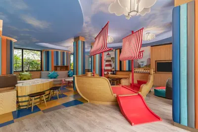 a childrens play area with chairs and tables at Four Points by Sheraton Phuket Patong Beach Resort in Patong Beach