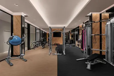 a gym with treadmills and weights at Four Points by Sheraton Phuket Patong Beach Resort in Patong Beach