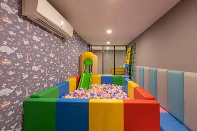 a childrens play room with a pile of balls at Sea View Panora Surin by Holy Cow, 1-BR in Surin Beach
