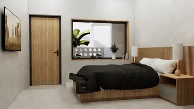 a bedroom with a large black bed and a mirror at The Grey House Palai Phuket in Chalong