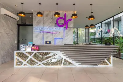 a lobby with a bench in front of a store at Diamond CONDO by VС in Bang Tao Beach