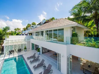 an aerial view of a house with a swimming pool at Villa Borimas by Elite Havens in Surin Beach
