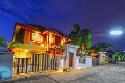 a house at night with lights at 74 Patong villa walk to Bangla Rd in 10min 3 room cozy modern style in Patong Beach