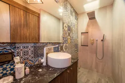 a bathroom with a sink and a shower at 2BDR Apartment near Surin beach PALM-C703 in Surin Beach