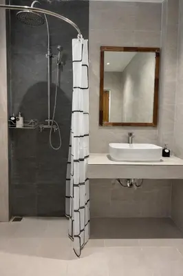 a bathroom with a sink and a shower at Phi Phi Chang Grand Resort in Phi Phi Don