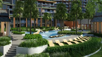 a resort with a swimming pool with a water park at Panora sea view -modern facilities walk to beach in Surin Beach