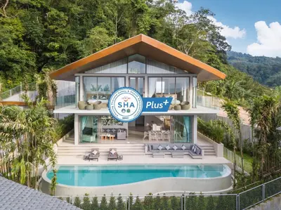 a house with a pool in front of it at Himmapana Villas - Terraces - SHA Extra Plus in Kamala Beach
