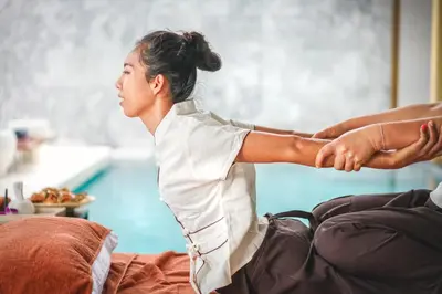 a woman is holding the arm of a man at Himmapana Villas - Terraces - SHA Extra Plus in Kamala Beach