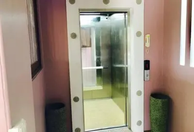 a mirror in a bathroom with a shower at Tyler Cherngtalay in Ban Pak Lak