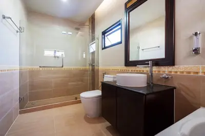 a bathroom with a sink and a toilet and a shower at Angel Pool Villa Phuket - SHA Extra Plus - indoor Warm pool in Phuket Town