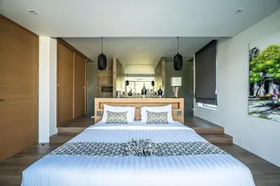 a bedroom with a large bed in a room at Cocoon Villa - Peaceful private pool villa in north Phuket in Phuket Town