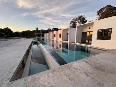 a swimming pool on the roof of a building at Pine Bungalow Krabi in Klong Muang Beach