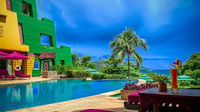 a view of the pool at a resort at Kata Beach Aspasia Boutique Apartment in Kata Beach