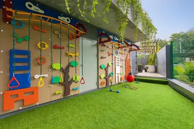 a play room with a climbing wall and a climbing gym at Calypso Garden by Villacarte in Rawai Beach