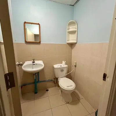 a bathroom with a toilet and a sink at Lam Sai village hotel Koh Yao Noi in Ko Yao Noi