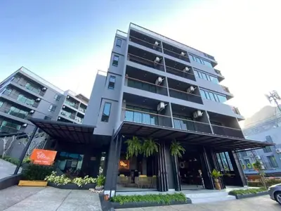 a large apartment building with a balcony at Aonang Dugong-SHA Extra Plus in Ao Nang Beach