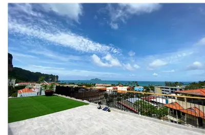 a view from the balcony of a building with a blue sky at Aonang Dugong-SHA Extra Plus in Ao Nang Beach