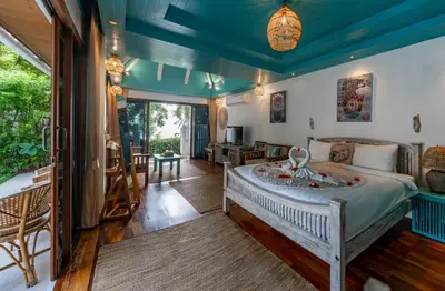 a bedroom with a king sized bed in a room at Soul Villas - Beachfront Private Pool Villas, Phuket Nature Retreat in Panwa Beach