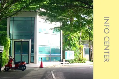 a scooter parked in front of a building at Pool Access 2 BDR Stylish Condo in Kamala Beach